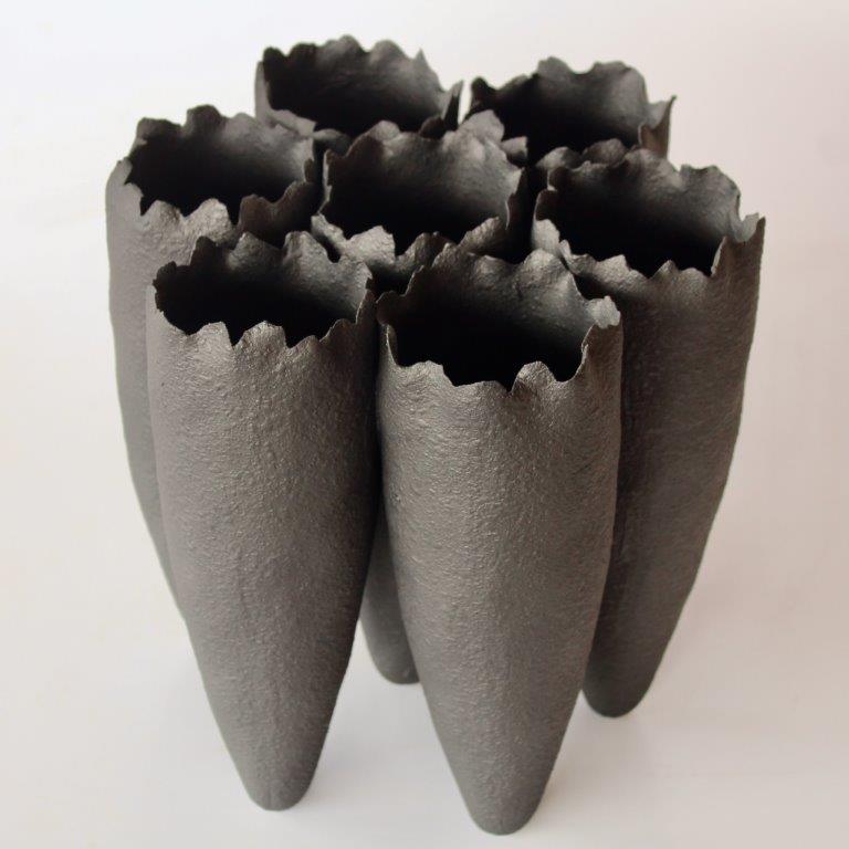 7 Black Ceramic Vases Joined