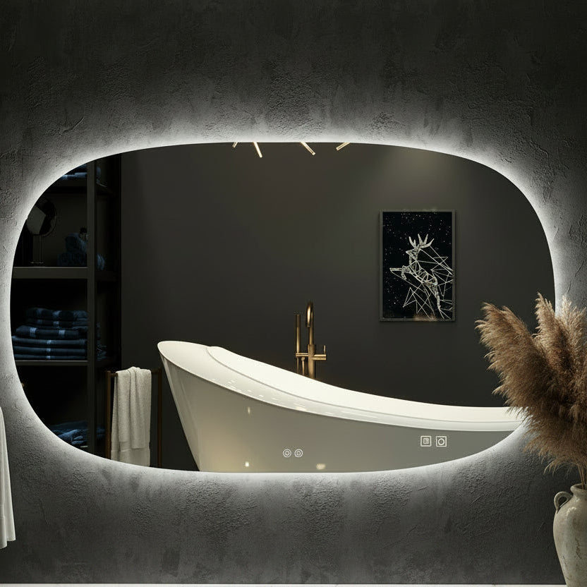 Bathroom with a freestanding bathtub and a mirror reflecting a dark wall with a deer painting.