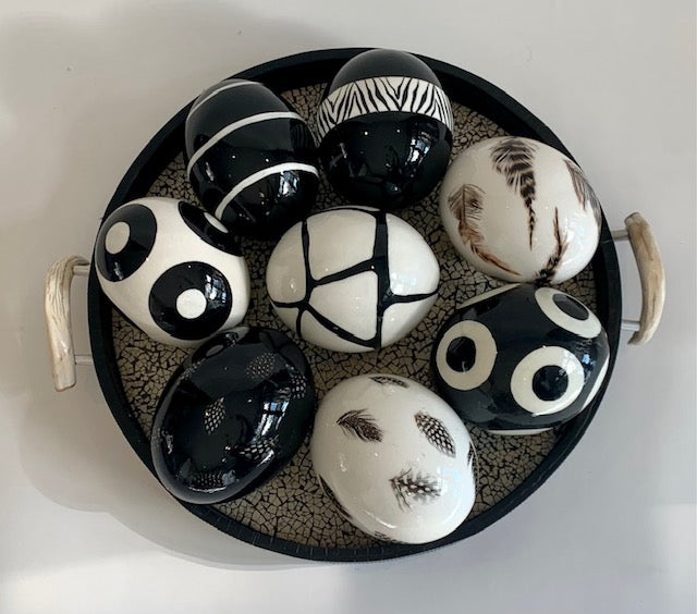8 Black & White ostrich eggs on leather tray with ostrich egg inlay and warthog handles