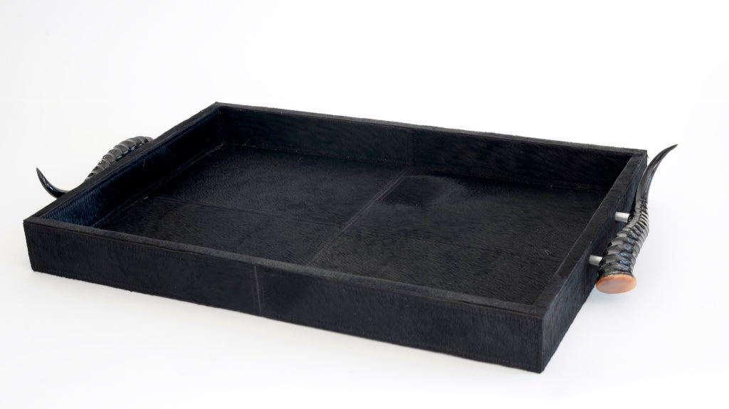 Black cow skin tray with springbok handles