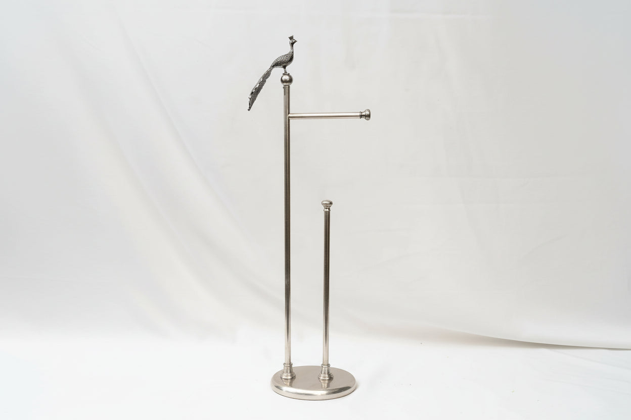 Silver towel stand with peacock finial on a white background