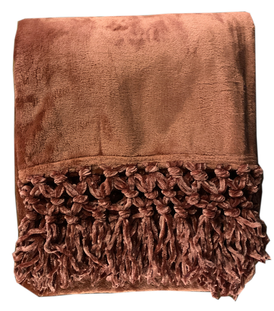Indulge in luxury with our Plush Throw in Ginger. This elegant throw offers unparalleled softness and warmth, making it the perfect addition to any home. Its stunning ginger color adds a touch of sophistication to any room, creating a cozy and inviting atmosphere. Elevate your home decor with this exclusive piece.