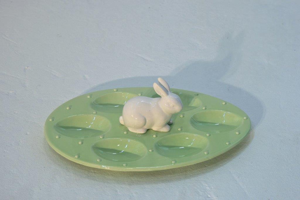 White Ceramic Rabbit on Green Egg Plate