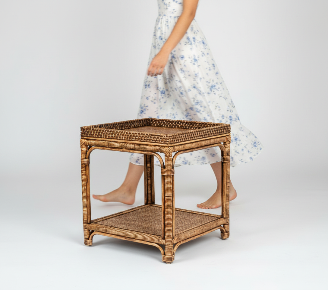 Wicker side table with a textured surface on a white background