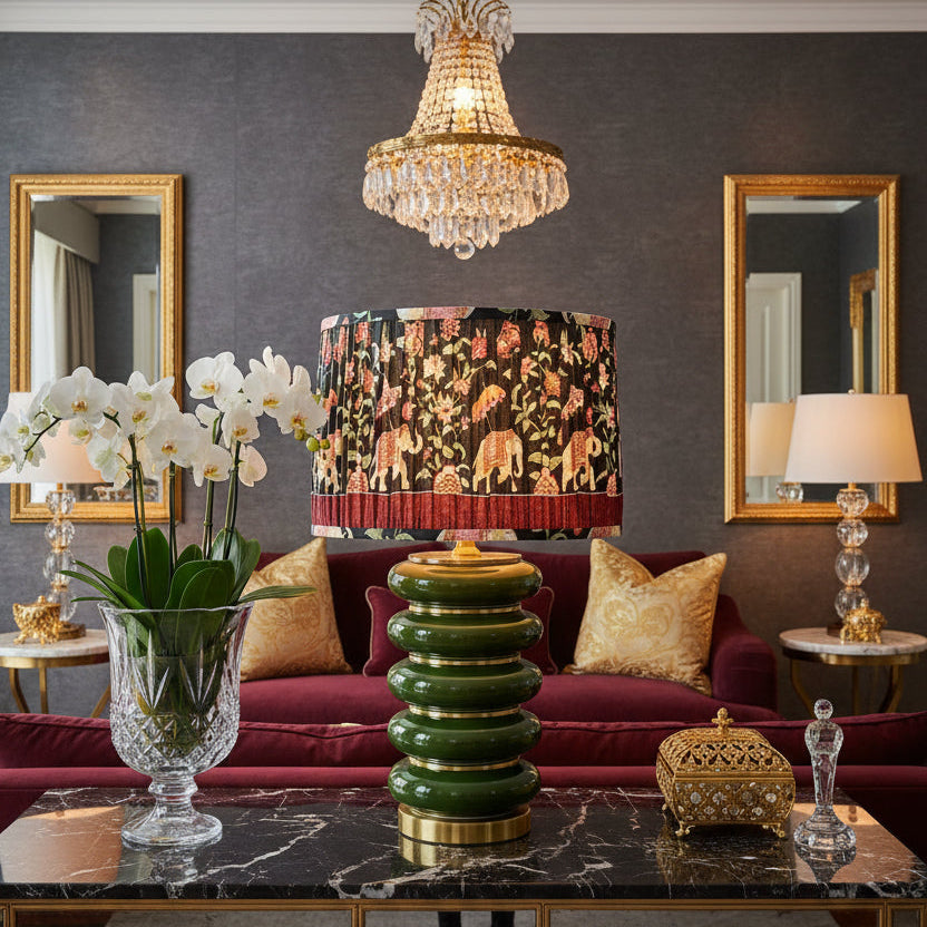 Luxurious living room with a chandelier, floral arrangement, and decorative items.