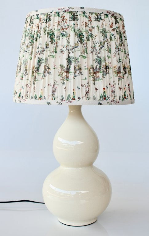 CREAM BULBOUS LAMP BASE WITH TOILE SHADE