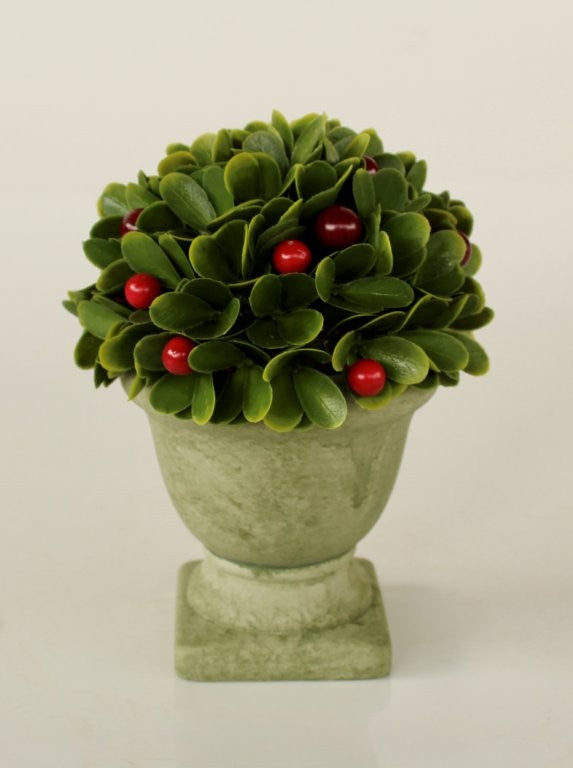 FAUX CAMILLA LEAVES WITH BERRIES IN POT WITH FOOT