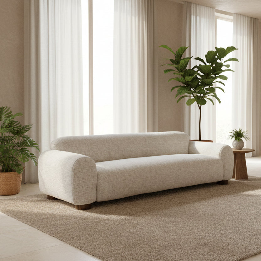 Beige sofa on a white background