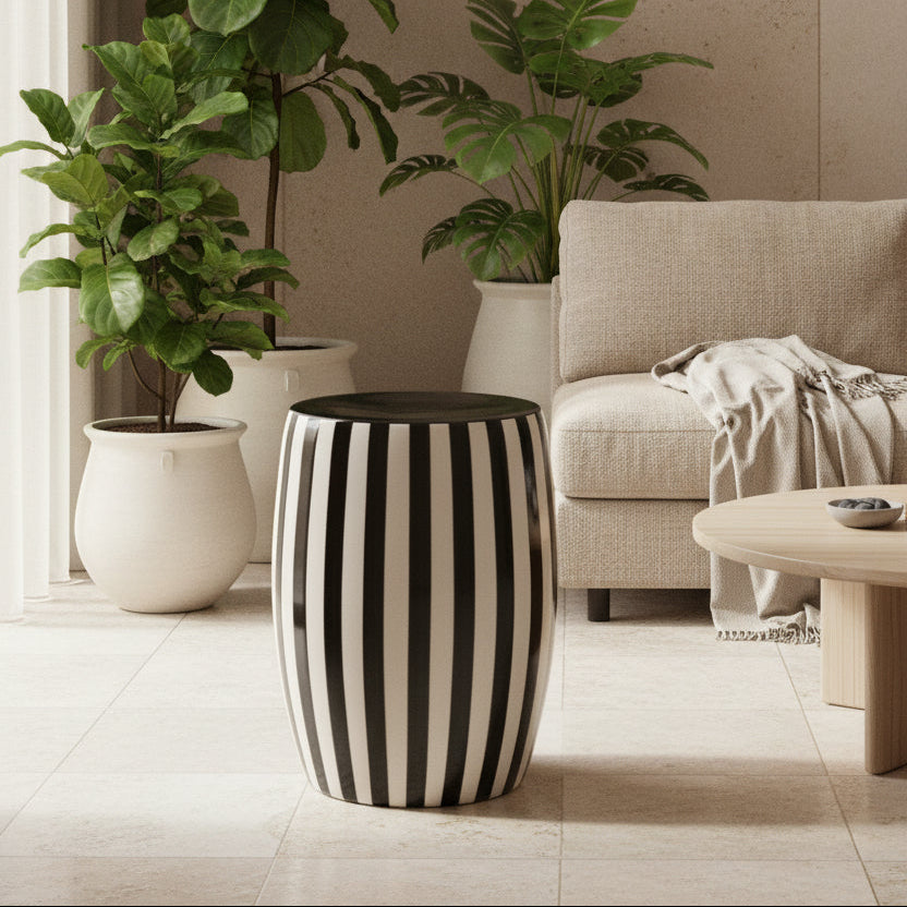 Black and white striped stool on a light gray background