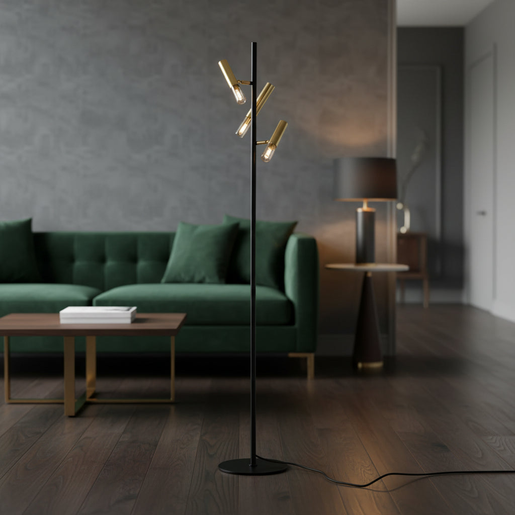 Black floor lamp with gold accents on a white background