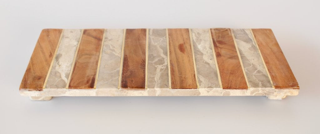 WOOD, BRASS AND BEIGE MARBLE STRIPED BOARD ON FEET