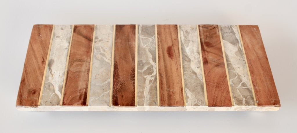 WOOD, BRASS AND BEIGE MARBLE STRIPED BOARD ON FEET
