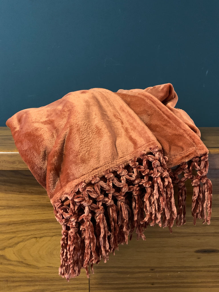 Indulge in luxury with our Plush Throw in Ginger. This elegant throw offers unparalleled softness and warmth, making it the perfect addition to any home. Its stunning ginger color adds a touch of sophistication to any room, creating a cozy and inviting atmosphere. Elevate your home decor with this exclusive piece.