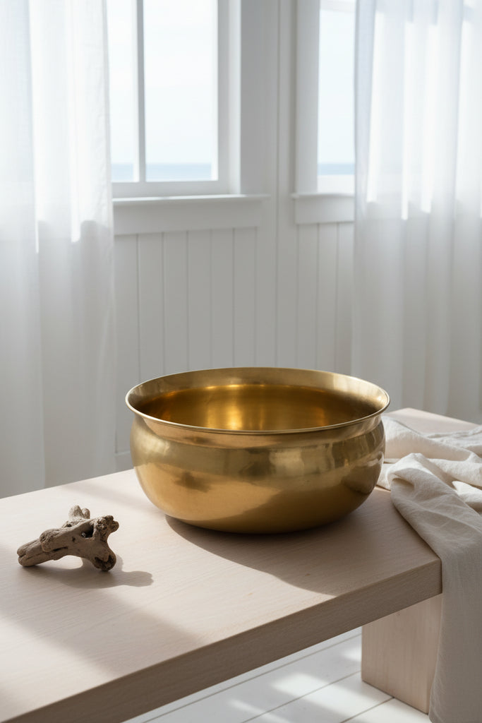 Brass bowl on a white background