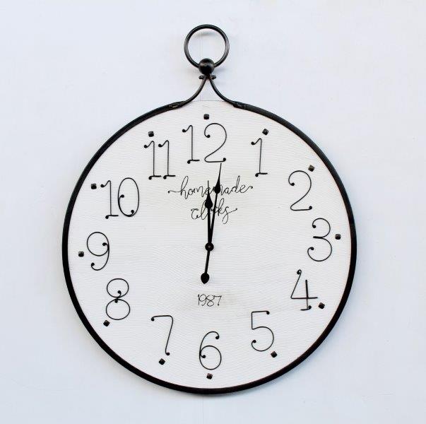 LARGE BLACK & WHITE IRON CLOCK - NetDécor 