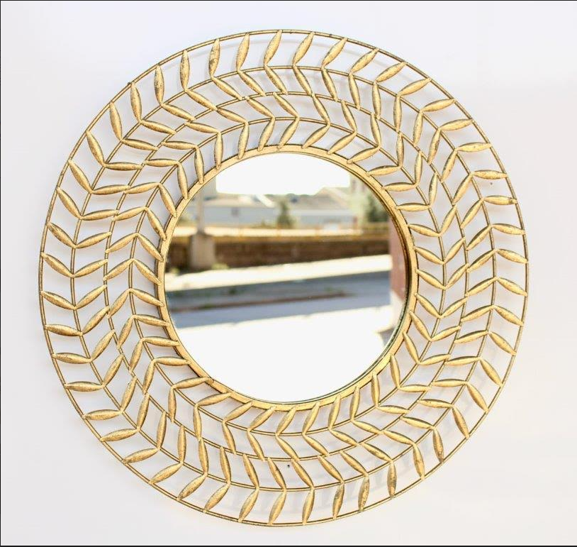 Round gold metal leaf detail mirror - NetDécor 