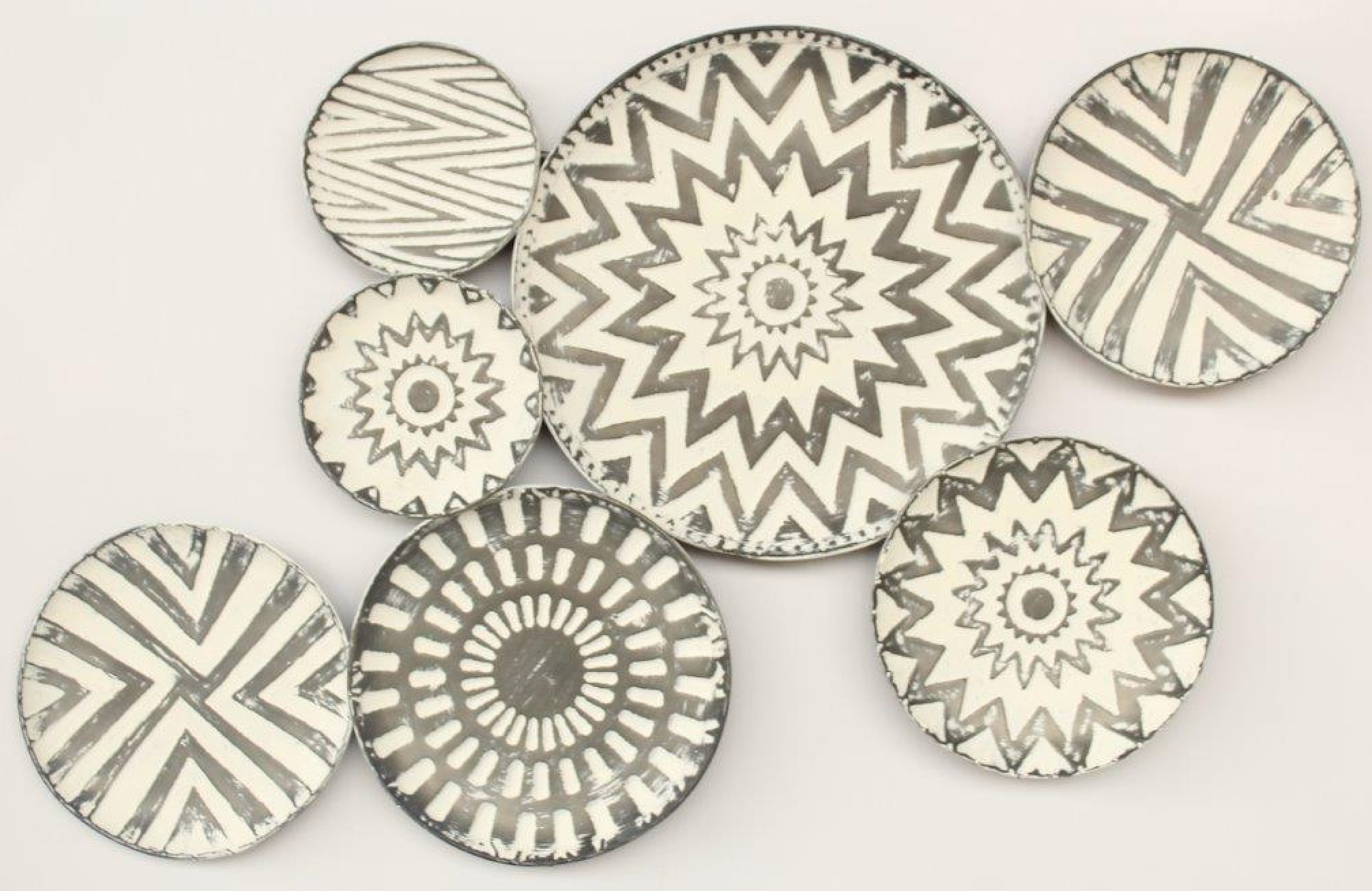 Grey and White 7 Metal Place Wall Hanging - NetDécor 